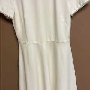 Elegant White Dress with Pearl Details